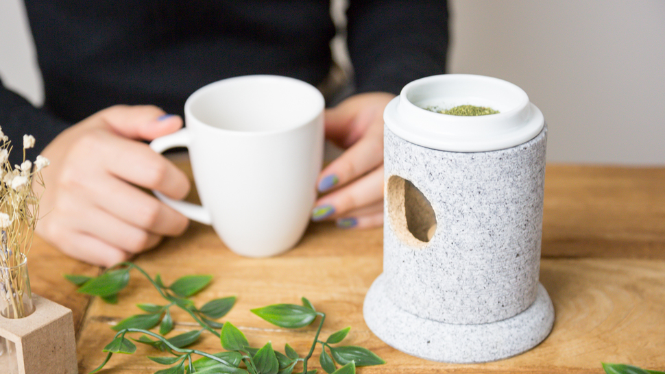 woman-drink-tea-at-the-side