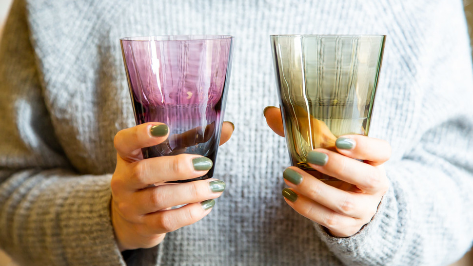 woman-hold-two-tumblers