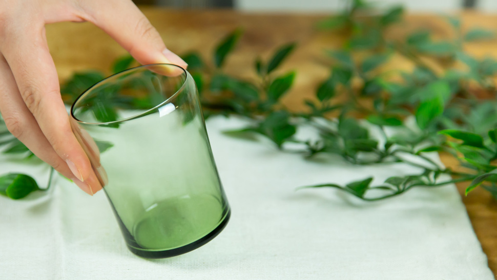 woman-taking-green-glass