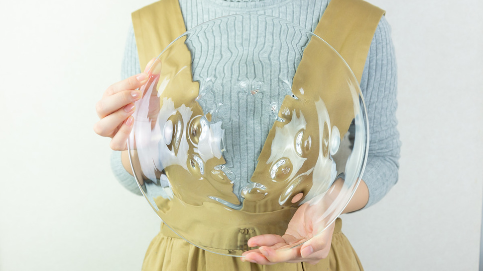 woman-holding-big-clear-plate